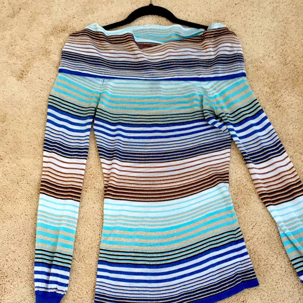 A blue, teal, brown, and gold colored blouse